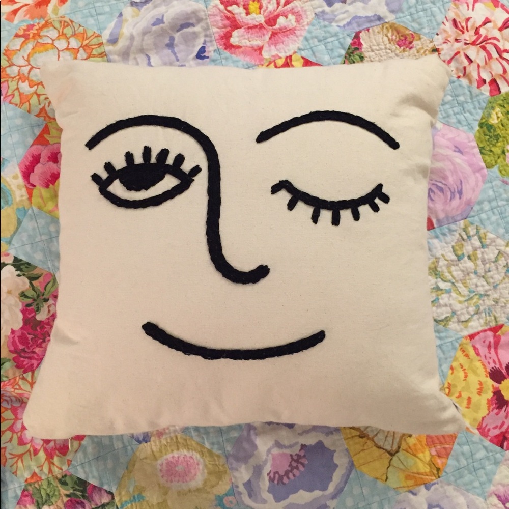 Urban Outfitters Winky Embroidered Pillow